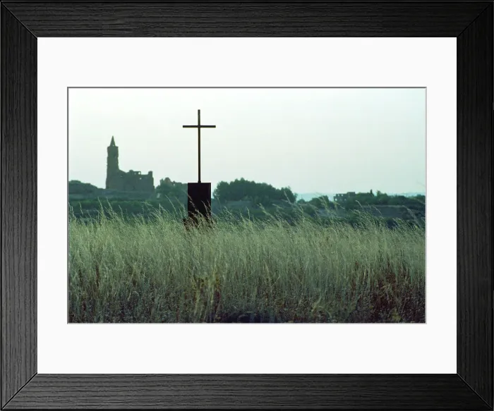 Framed Print : Memorial cross and view of ruined church, Belchite, Spain Framed Print : Memorial cross and view of ruined church, Belchite, Spain