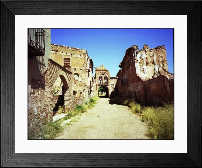 Framed Print : Main street with gatehouse, Belchite, Spain Framed Print : Main street with gatehouse, Belchite, Spain