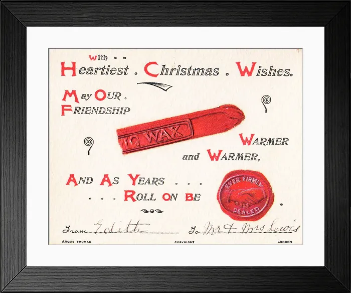 Framed Print : Sealing wax and seal with comic verse on a Christmas card Framed Print : Sealing wax and seal with comic verse on a Christmas card