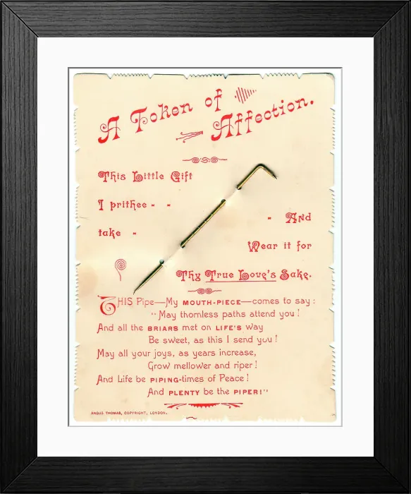 Framed Print : Metal pin with comic verse on a greetings card Framed Print : Metal pin with comic verse on a greetings card