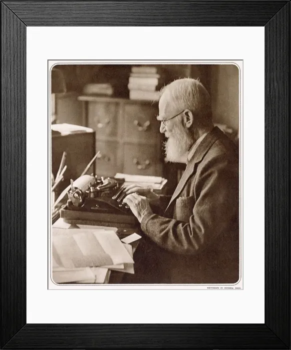 Framed Print : George Bernard Shaw (1856 - 1950), Irish playwright, critic, polemicist and political activist. Photograph showing Bernard Shaw at his typewriter when he was 82 years old. Date: 1939 Framed Print : George Bernard Shaw (1856 - 1950), Irish playwright, critic, polemicist and political activist. Photograph showing Bernard Shaw at his typewriter when he was 82 years old. Date: 1939