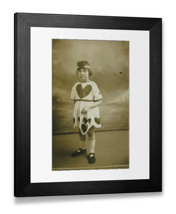Framed Print : Delightful photograph of a little girl called Margaret dressed in a costume embellished with love hearts. Date: 1926 Framed Print : Delightful photograph of a little girl called Margaret dressed in a costume embellished with love hearts. Date: 1926