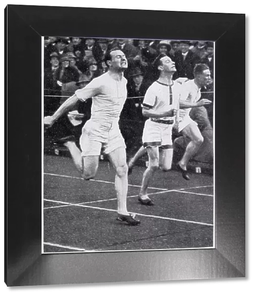 John Rinkel wins the 100-yards in even time (10sec) at the 1927 Varsity (Inter-University) Sports - a triumphant meeting for the Cambridge team. Date: 1927