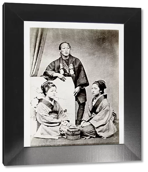 Japanese portrait - two seated women and a man