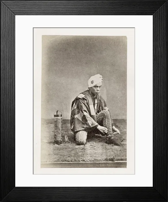 Framed Print : Early Japanese portrait: man tying shoe laces Framed Print : Early Japanese portrait: man tying shoe laces