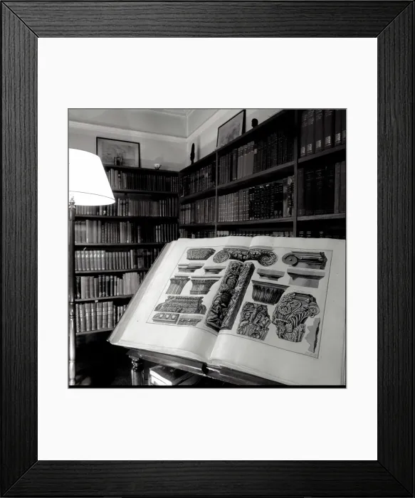 Framed Print : Bertrand Russell, 3rd Earl Russell (1872-1970), British philosopher and author -- a large book open at a page of architectural illustrations in the study of his home, Plas Penrhyn, Wales. Date: late 1960s Framed Print : Bertrand Russell, 3rd Earl Russell (1872-1970), British philosopher and author -- a large book open at a page of architectural illustrations in the study of his home, Plas Penrhyn, Wales. Date: late 1960s
