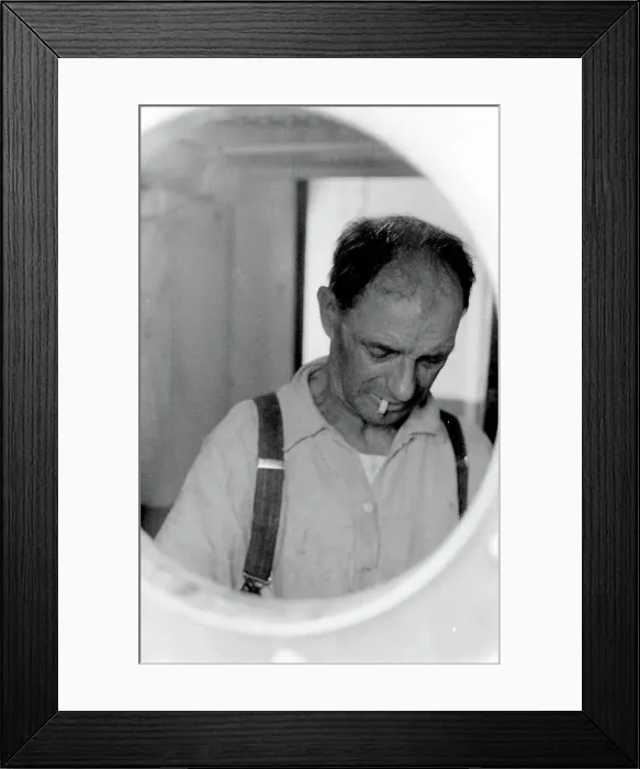 Framed Print : Life on a North Sea trawler - man viewed through porthole. Date: 1960s Framed Print : Life on a North Sea trawler - man viewed through porthole. Date: 1960s