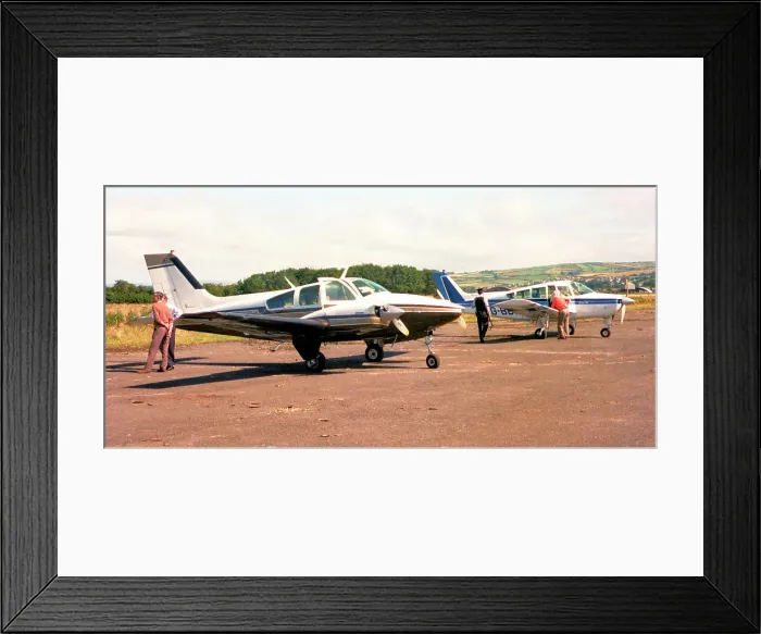 Framed Print : Beech Baron G-AZDK, with Beech Sierra G-BBXU Framed Print : Beech Baron G-AZDK, with Beech Sierra G-BBXU