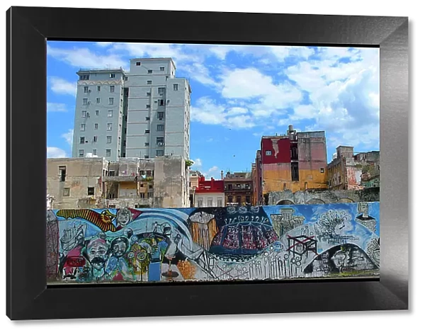 Graffiti and apartment buildings, Havana, Cuba