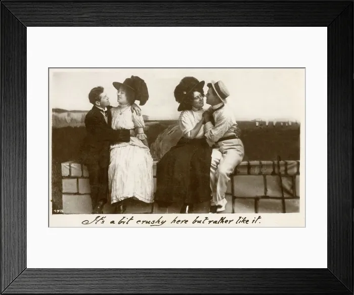 Framed Print : Two young couples sharing a seaside cuddle