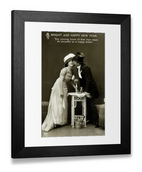 Framed Print : New Year Greetings Card - young couple - kiss on the cheek Framed Print : New Year Greetings Card - young couple - kiss on the cheek
