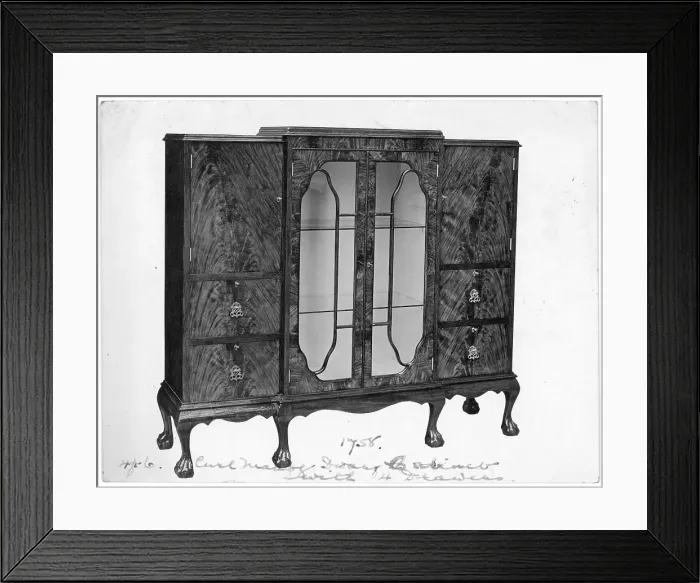 Framed Print : Walnut glass-fronted display cabinet Framed Print : Walnut glass-fronted display cabinet