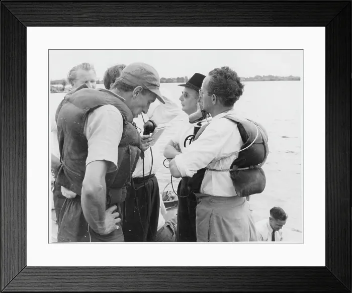 Framed Print : Raymond Baxter in life-jacket and base-ball cap
