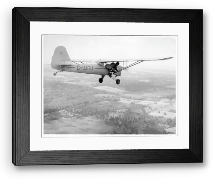 Framed Print : Parachutist preparing to jump from Auster J-1N Alpha G-AIGU Framed Print : Parachutist preparing to jump from Auster J-1N Alpha G-AIGU