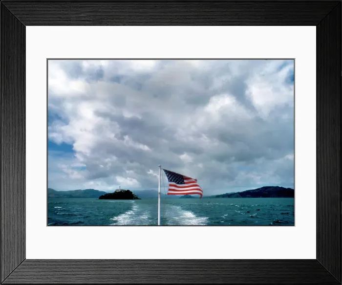 Framed Print : USA - View of Alcatraz from ferry with American Flag Framed Print : USA - View of Alcatraz from ferry with American Flag