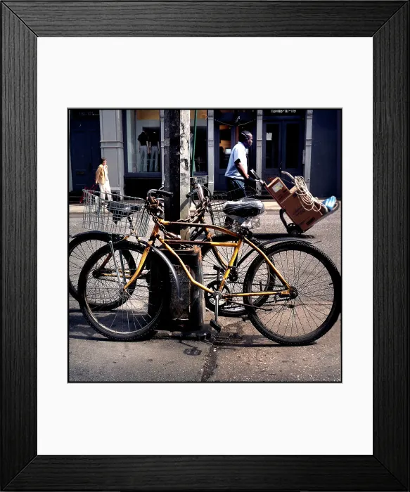 Framed Print : Bicycles and figures in New York Street Framed Print : Bicycles and figures in New York Street
