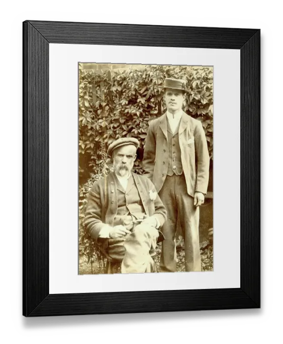 Framed Print : Father and son in a garden