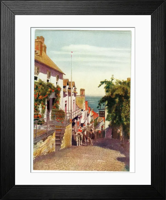 Framed Print : Cobbled main street Clovelly looking towards the sea Framed Print : Cobbled main street Clovelly looking towards the sea