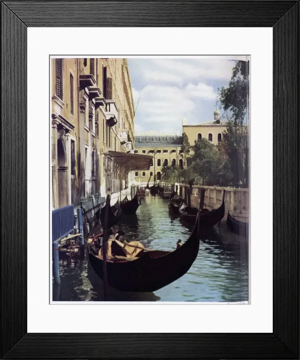 Framed Print : Tranquil scene of a gondola on a canal in Venice. Date: 1954 Framed Print : Tranquil scene of a gondola on a canal in Venice. Date: 1954