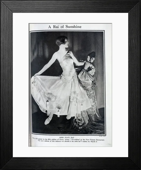 Framed Print : Jean Rai, cabaret performer, theatrical portrait in satin gown, with doll. Captioned, A Rai of Sunshine'. With description, Miss Jean Rai Framed Print : Jean Rai, cabaret performer, theatrical portrait in satin gown, with doll. Captioned, A Rai of Sunshine'. With description, Miss Jean Rai