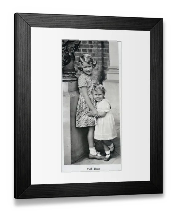 Framed Print : York Roses, Princesses Elizabeth and Margaret, informal outdoor photograph by a pillar. With description, York Roses; Princess Elizabeth and Princess Margaret, the daughters of the Duke and Duchess of York Framed Print : York Roses, Princesses Elizabeth and Margaret, informal outdoor photograph by a pillar. With description, York Roses; Princess Elizabeth and Princess Margaret, the daughters of the Duke and Duchess of York