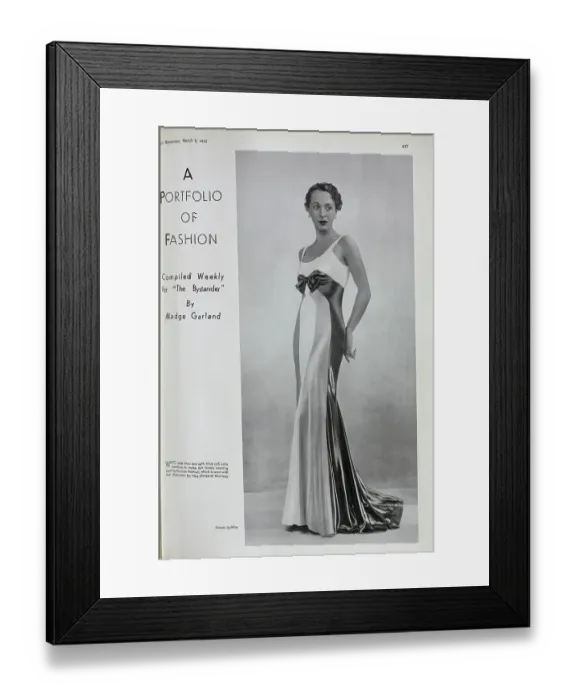 Framed Print : Margaret Rawlings, actress, (1906-1996) fashion studio portrait. With description, White, pale blue and dark blue cire satin combine to make this lovely evening gown by Norman Hartnell Framed Print : Margaret Rawlings, actress, (1906-1996) fashion studio portrait. With description, White, pale blue and dark blue cire satin combine to make this lovely evening gown by Norman Hartnell