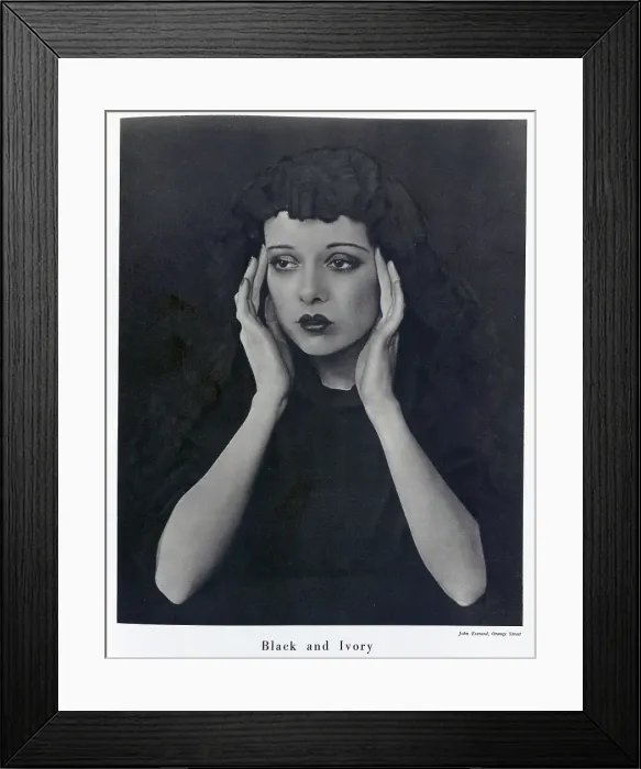 Framed Print : Sepha Treble, actress, (1908-1995), studio portrait wearing black mantilla. Captioned, Black and Ivory'. With description, Sepha Treble Wears a Mantilla; A black dress and a black lace mantilla, Sepha Treble's face and hands Framed Print : Sepha Treble, actress, (1908-1995), studio portrait wearing black mantilla. Captioned, Black and Ivory'. With description, Sepha Treble Wears a Mantilla; A black dress and a black lace mantilla, Sepha Treble's face and hands