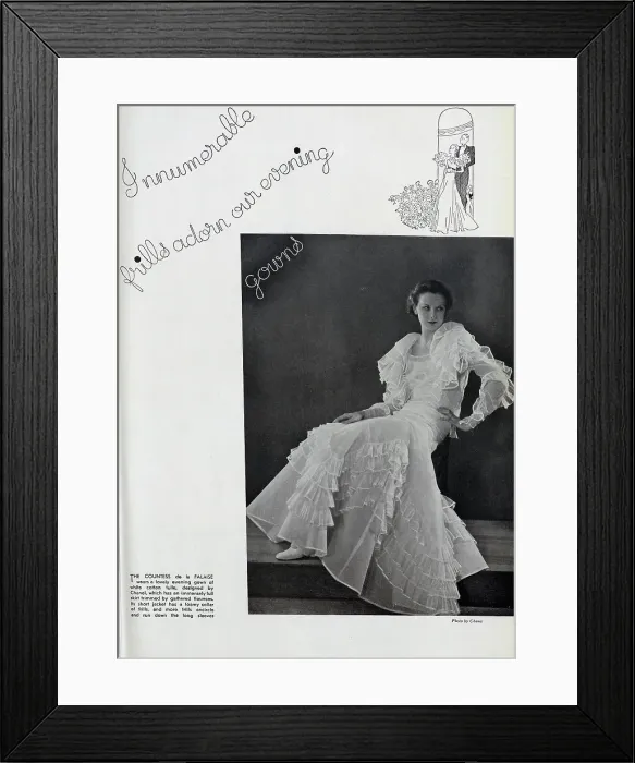 Framed Print : Countess de la Falaise, studio fashion portrait, by Chanel. Captioned, Innumerable frills adorn our evening gowns'. With description, The Countess de la Falaise, wears a lovely evening gown of white cotton tulle, designed by Chanel