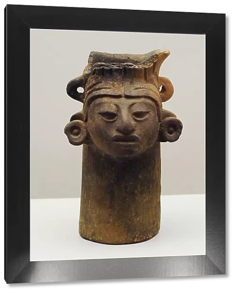 Vase decorated with human head. Ceramics, Zapotec culture