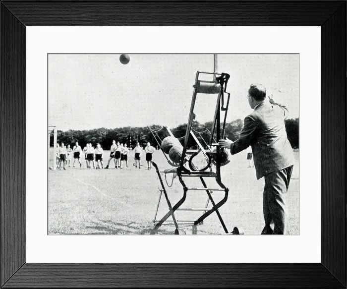 Framed Print : Corner kick from goal shooting machine Framed Print : Corner kick from goal shooting machine