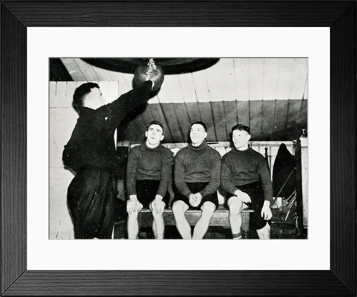 Framed Print : Cardiff City Players keep fit using a punch ball Framed Print : Cardiff City Players keep fit using a punch ball
