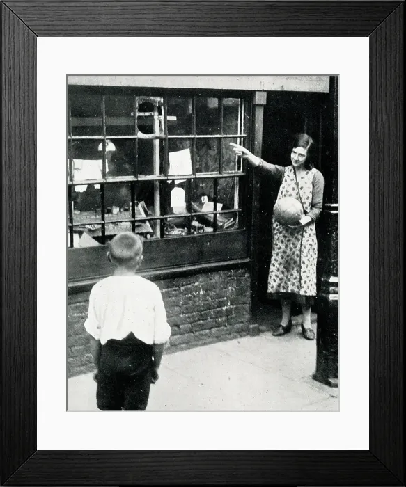 Framed Print : Shop window damaged by football Framed Print : Shop window damaged by football