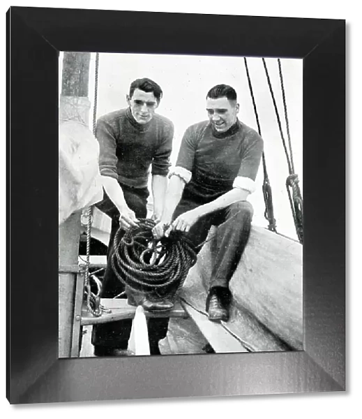 Football brothers, Frank and Fred Swift, on their boat