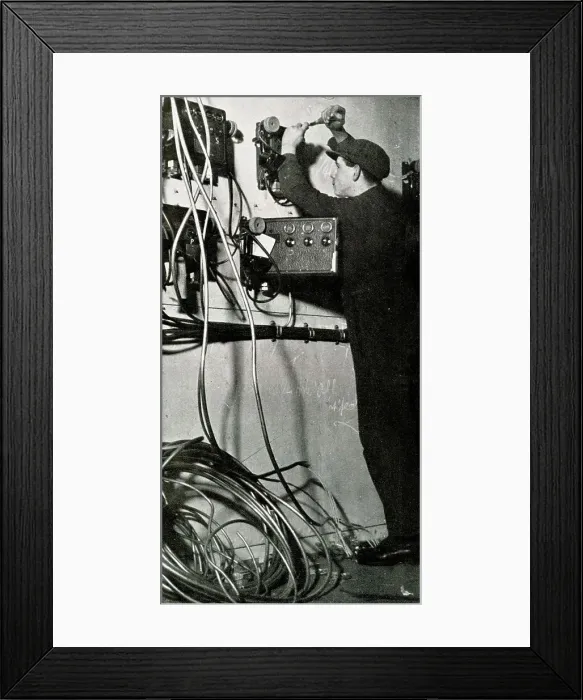 Framed Print : RMS Queen Mary, telephone engineer prior to launch Framed Print : RMS Queen Mary, telephone engineer prior to launch