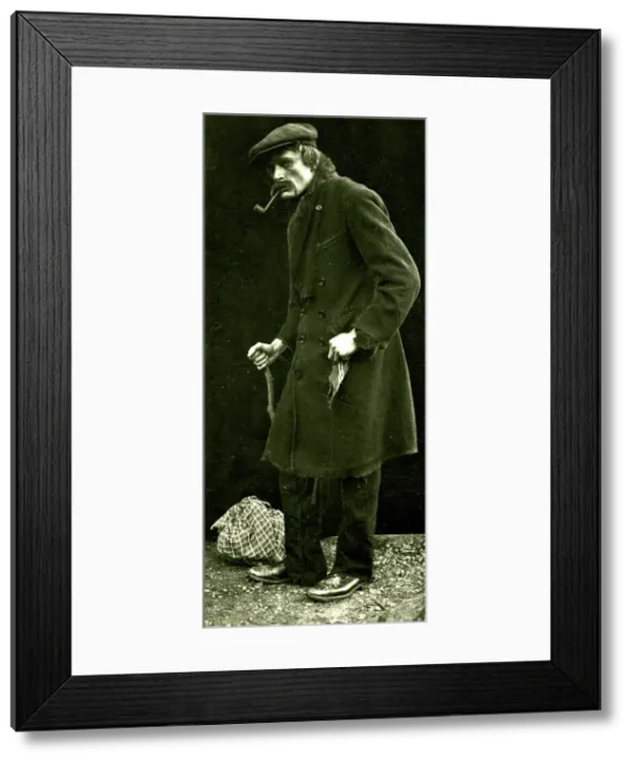 Framed Print : Old man with walking stick, smoking a pipe Framed Print : Old man with walking stick, smoking a pipe