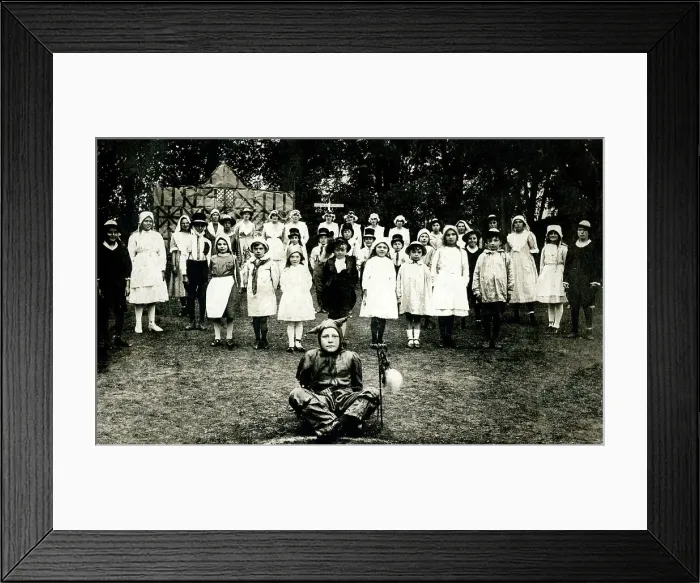Framed Print : Village Fancy Dress with Boy Jester Framed Print : Village Fancy Dress with Boy Jester