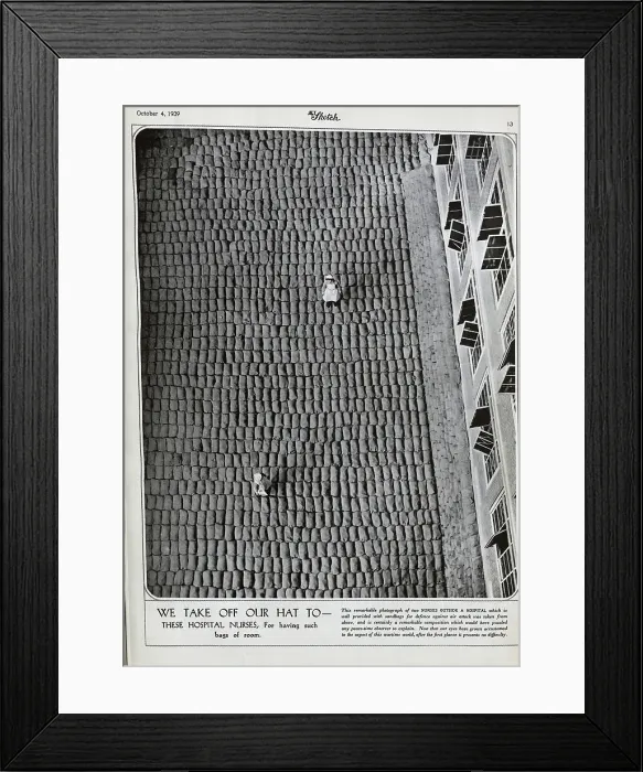 Framed Print : Two nurses in uniform, on thousands of sandbags Framed Print : Two nurses in uniform, on thousands of sandbags