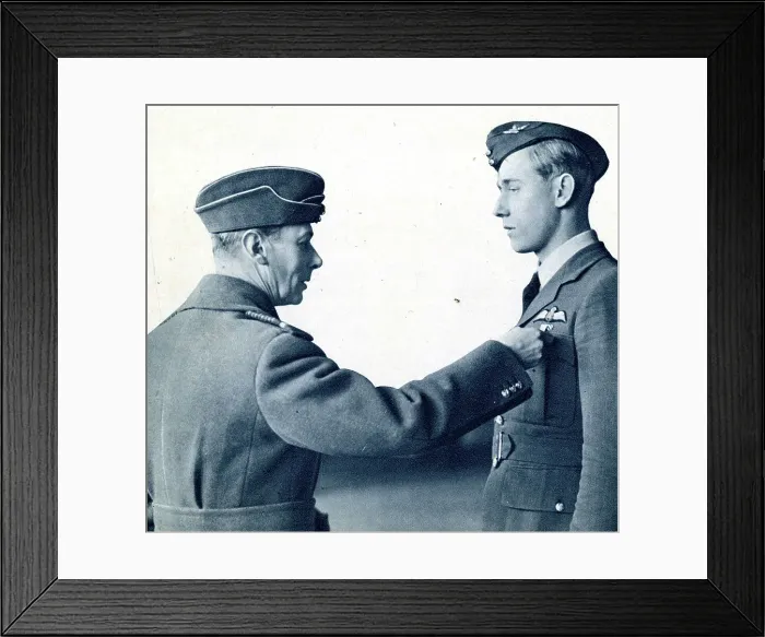 Framed Print : King George VI pins DFC on pilot officer, WW2 Framed Print : King George VI pins DFC on pilot officer, WW2