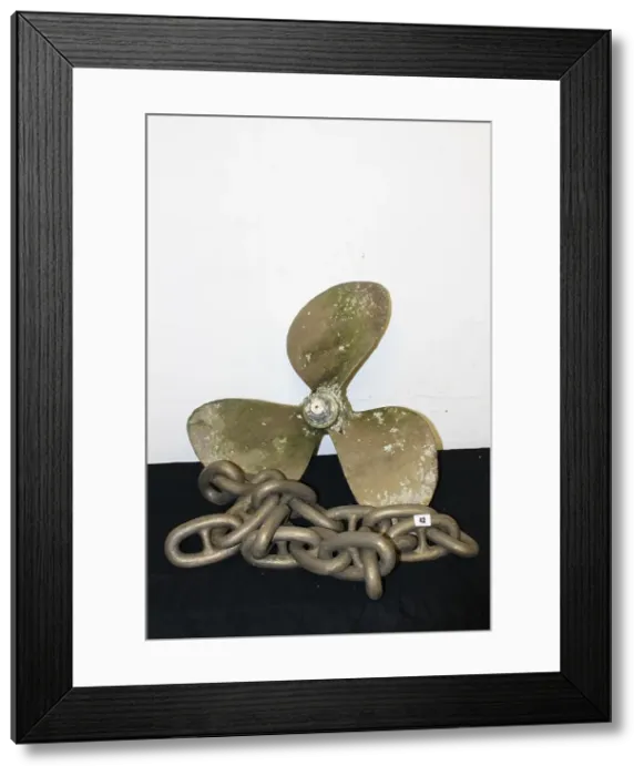 Framed Print : Brass anchor chain and propeller from WW1 period Framed Print : Brass anchor chain and propeller from WW1 period