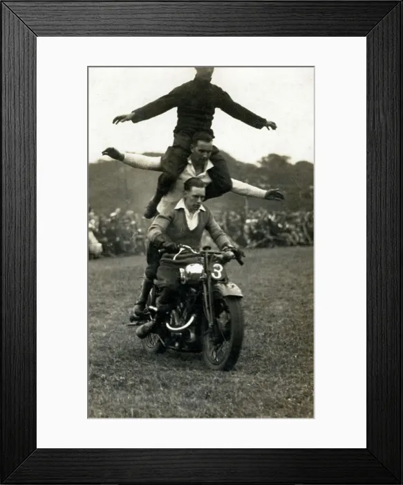 Framed Print : A stunt Motorcycle acrobatic display team Framed Print : A stunt Motorcycle acrobatic display team