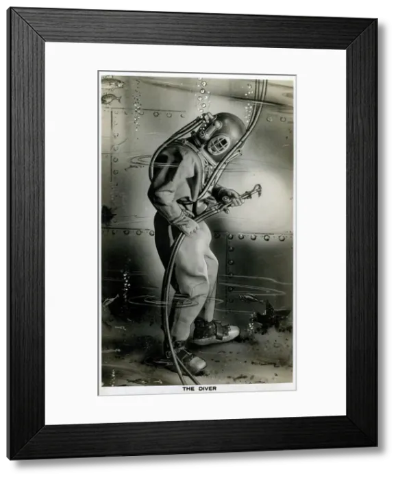 Framed Print : Diver working on the hull of a ship underwater Framed Print : Diver working on the hull of a ship underwater