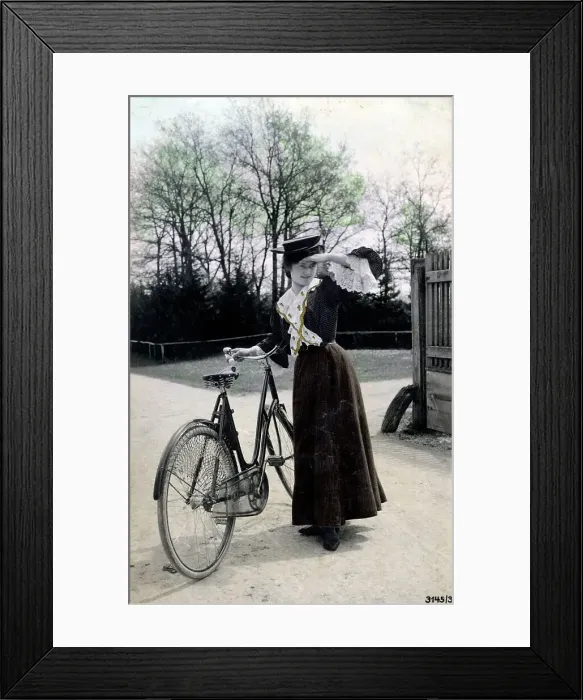 Framed Print : Pretty young woman with her lovely bicycle