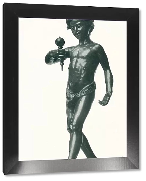 Bilboquet. A portrait sculpture of a boy playing with a bilboquet