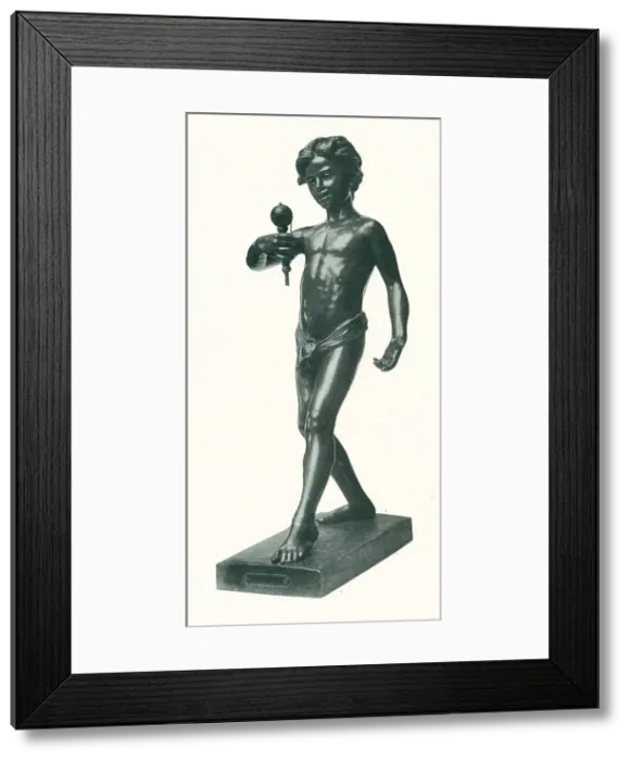 Framed Print : Bilboquet. A portrait sculpture of a boy playing with a bilboquet Framed Print : Bilboquet. A portrait sculpture of a boy playing with a bilboquet