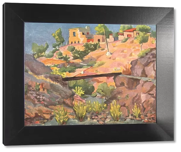 La Rambla. A landscape oil painting of some town houses situated on a hilltop