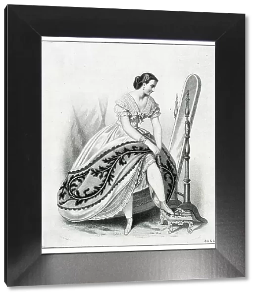Woman in crinoline dress, getting ready to go out