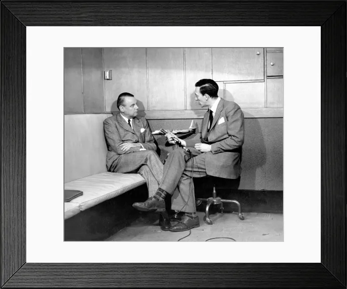 Framed Print : Raymond Baxter conducting an interview with an American Airl Framed Print : Raymond Baxter conducting an interview with an American Airl
