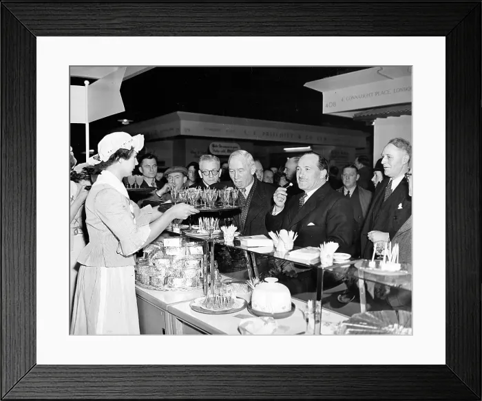 Framed Print : Politicians and dignitaries enjoying the samples at a food e Framed Print : Politicians and dignitaries enjoying the samples at a food e