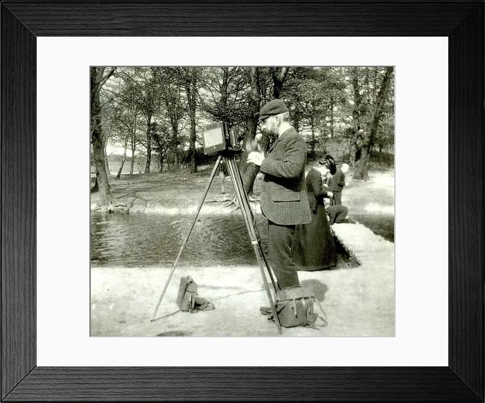 Framed Print : Photographer in a park with wooden camera on tripod Framed Print : Photographer in a park with wooden camera on tripod