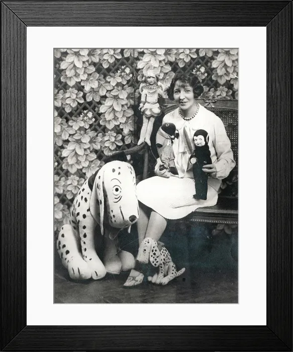 Framed Print : Woman with soft toys including Dismal Desmond Framed Print : Woman with soft toys including Dismal Desmond